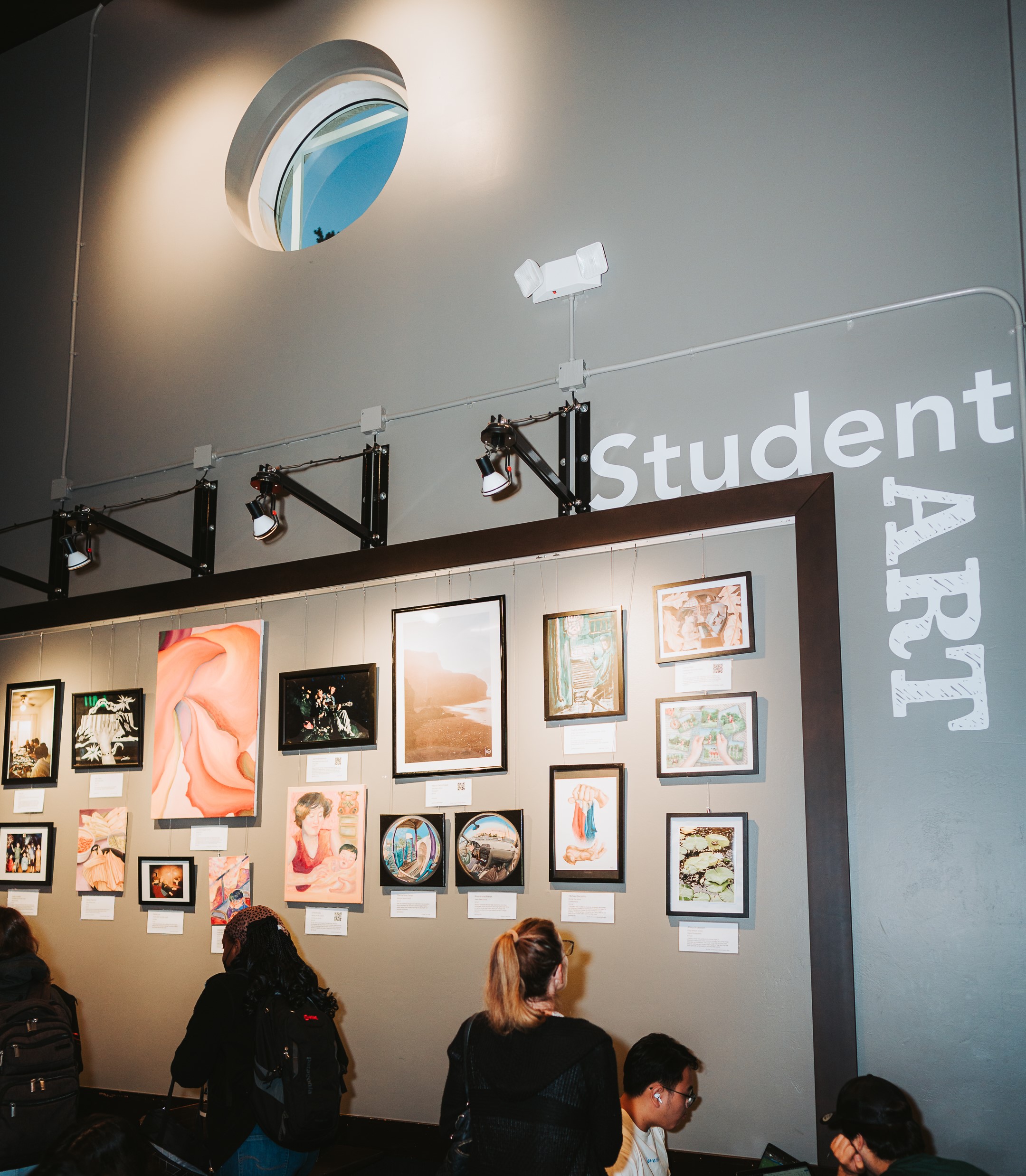 Display of students' artwork at the "Call For Art" exhibition